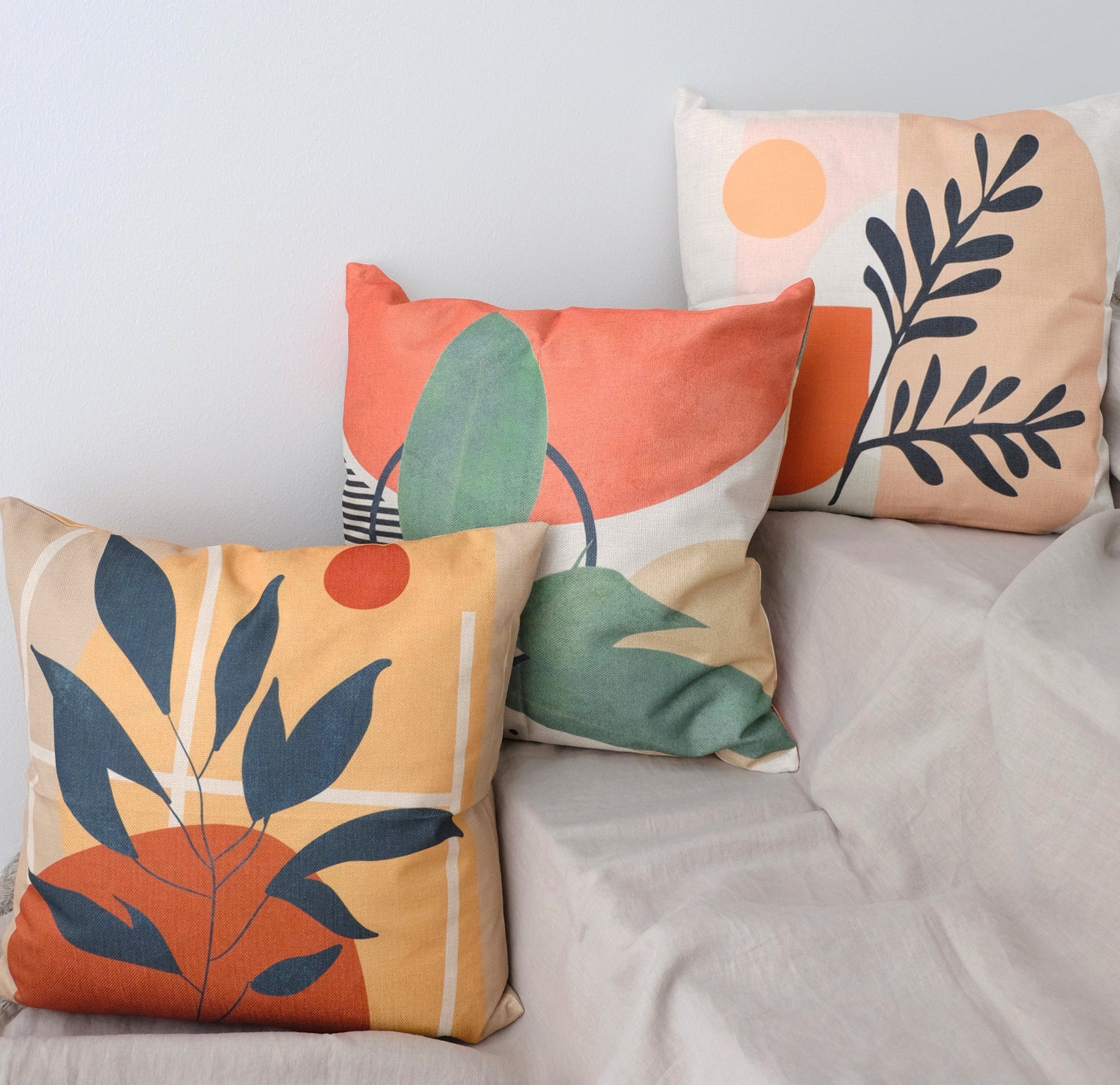 By Javy-tyynyt yhdistettynä – kuviollinen oranssi beige tyynynpäällinen asetelma